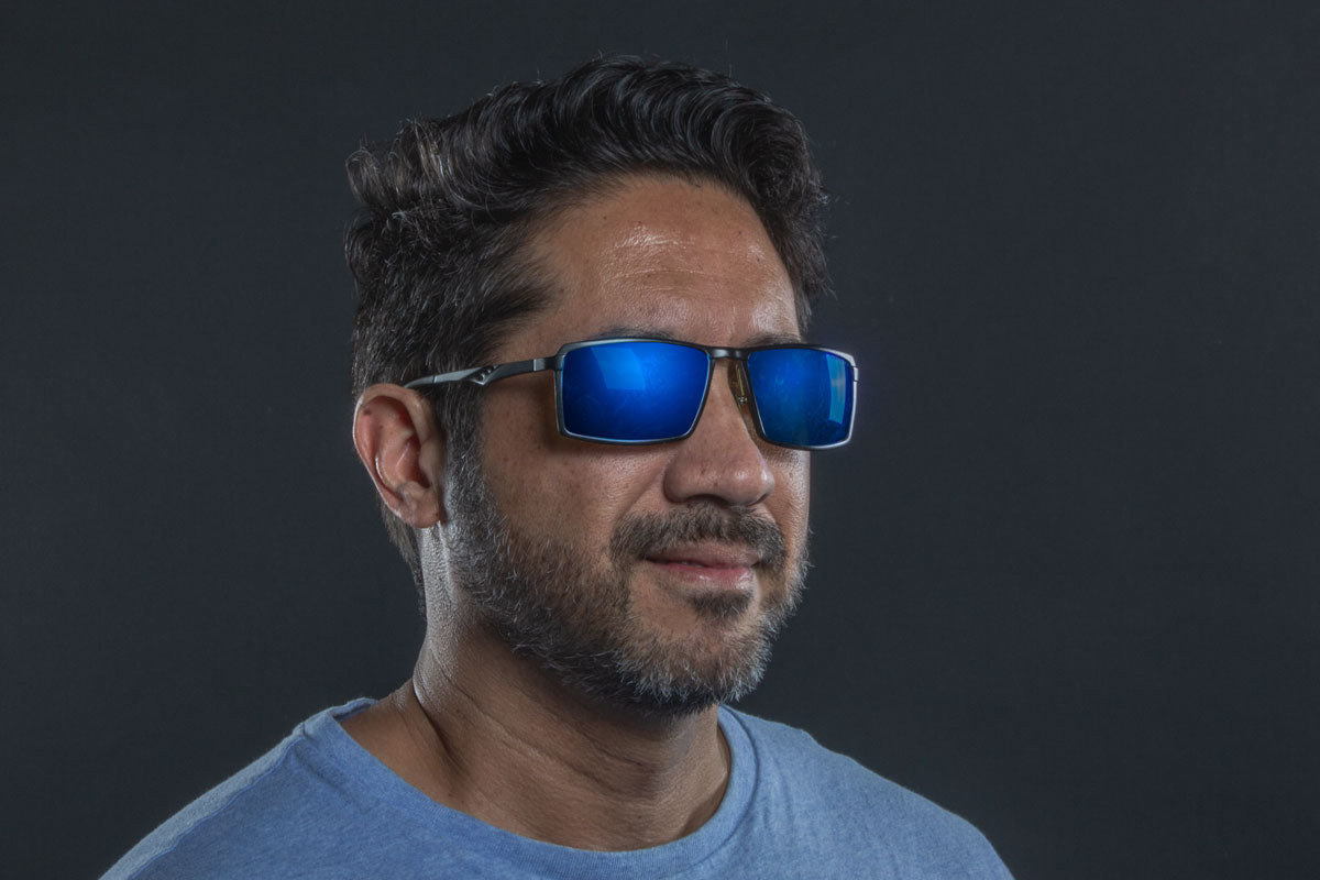 Man wearing blue venom redline sunglasses